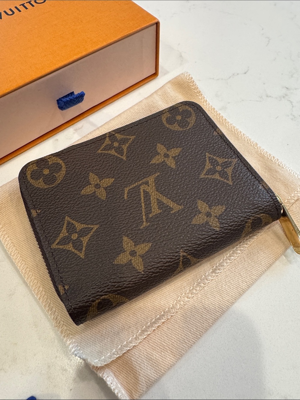 Louis Vuitton Monogram Canvas zippy coin purse